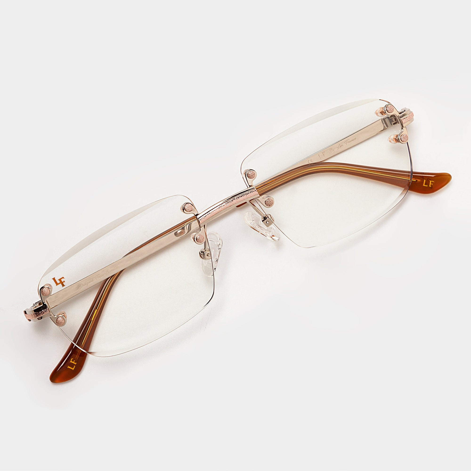 Silver & Rose Gold Two Tone Rimless Class - (Light Adaptive) Clear to Brown Lens