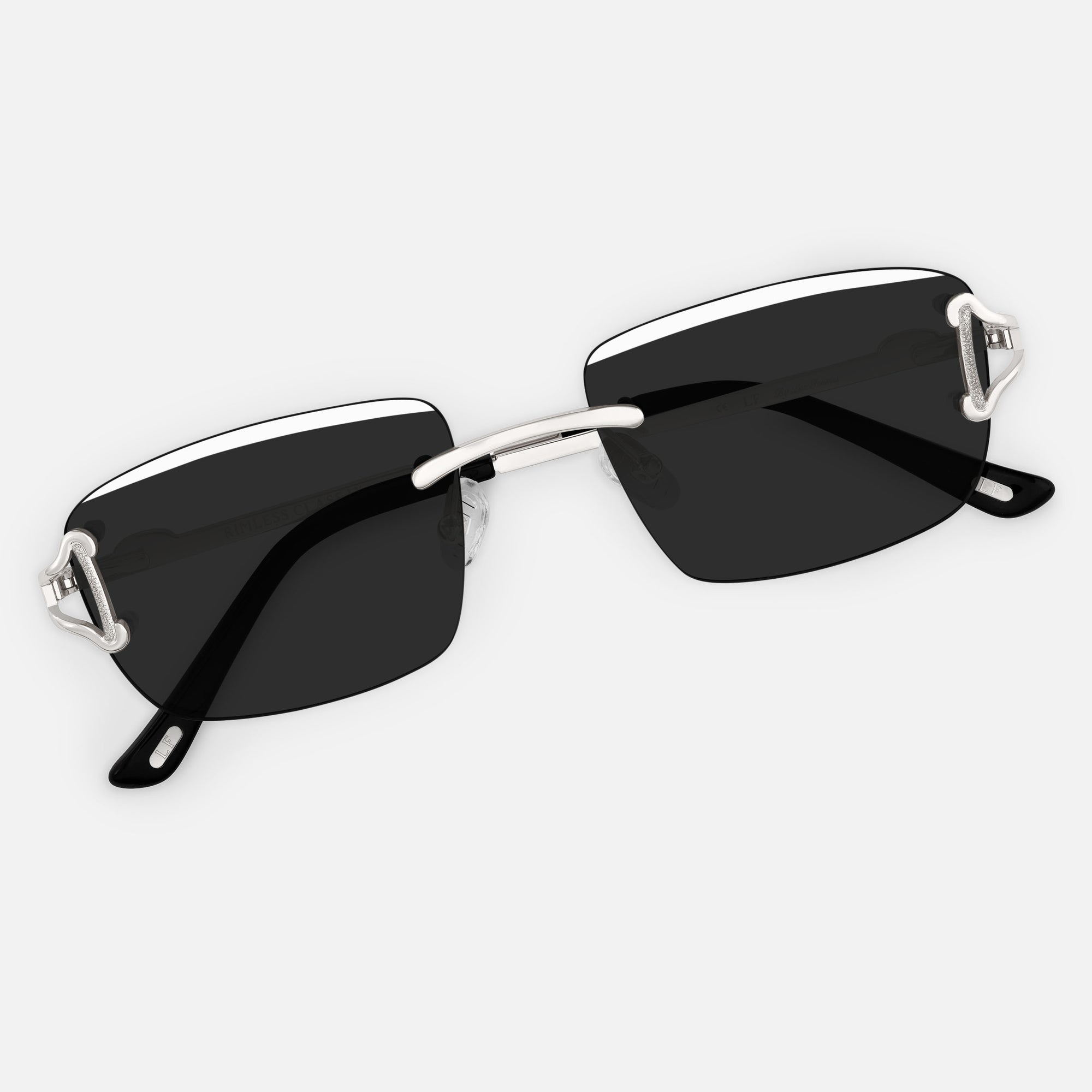Silver Rimless Class IX - (Light Adaptive) Clear to Black Lens