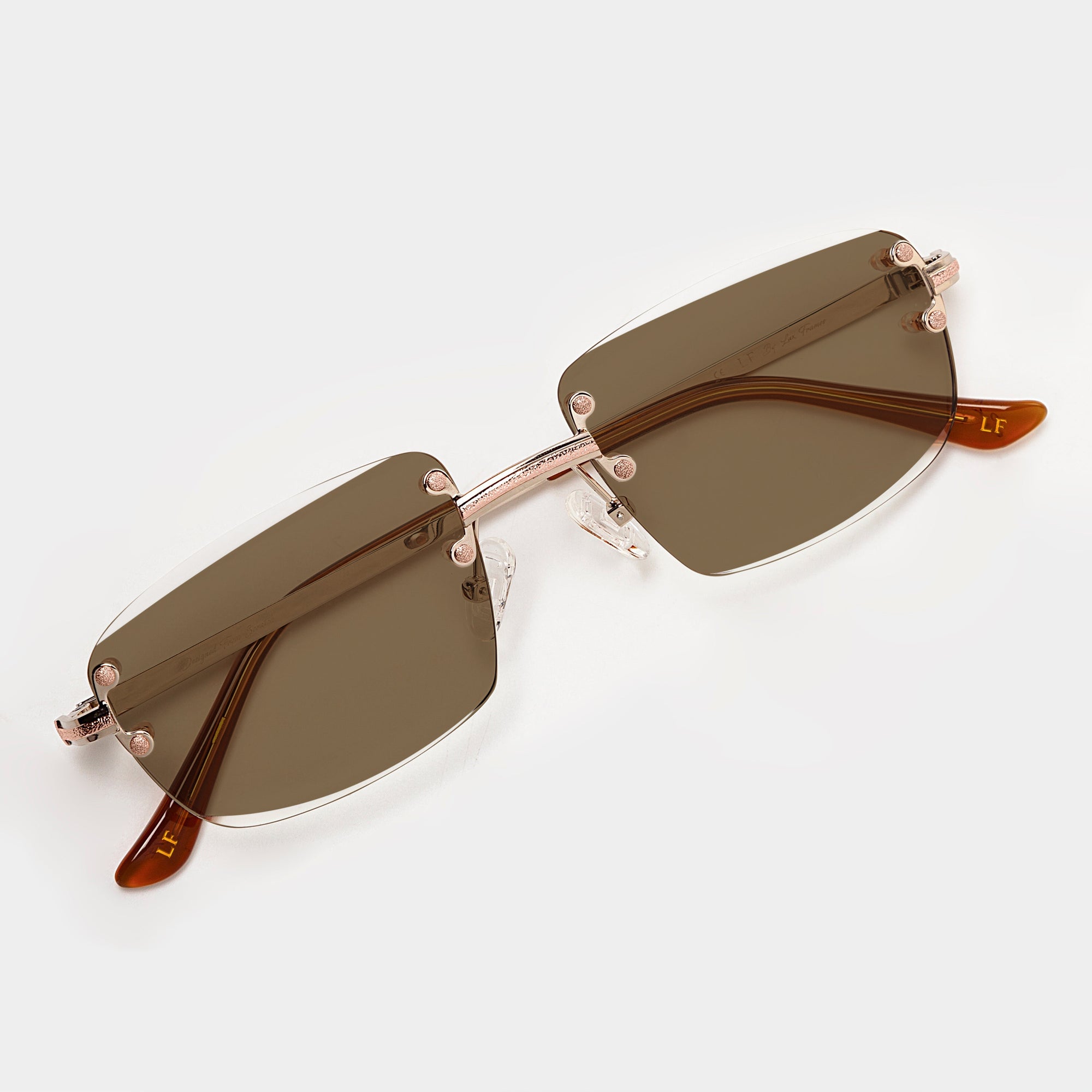 Silver & Rose Gold Two Tone Rimless Class - (Light Adaptive) Clear to Brown Lens